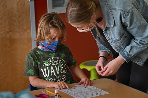 Young student with a teacher